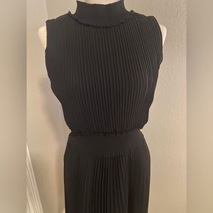 Pleated black dress from Nanette Lepore in size 10.